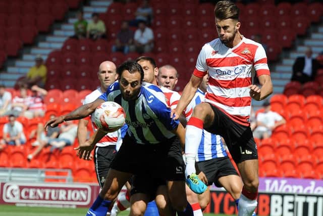 Liam Wakefield, right, in action for Doncaster Rovers. Picture: Andrew Roe