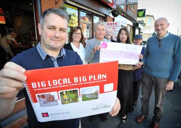 Martyn Rawlinson with community leaders and residents with the Big Local plan for the area