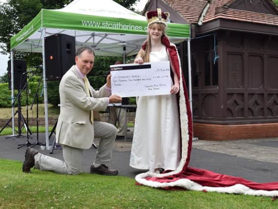 Isobel Devine presenting a cheque to Stephen Greenhalgh, chief executive of St Catherines Hospice
