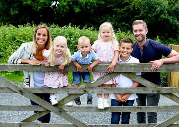 Laura Dove with husband Gareth and her children Lewis, 12, Eva, four, Megan, three and Harrison, two.