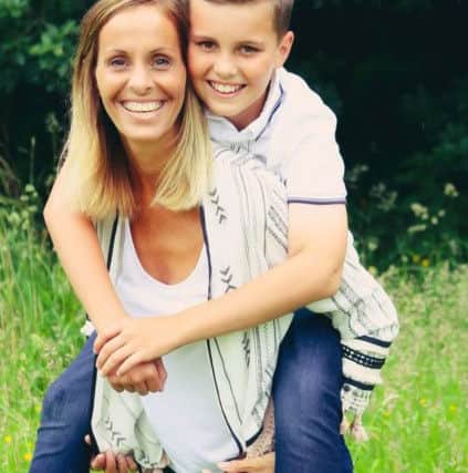 Laura Dove with her eldest son Lewis. She says he has been her rock and has been through so much but has kept her going