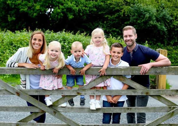 Laura Dove with husband Gareth and her children Lewis, 12, Eva, four, Megan, three, and Harrison, two