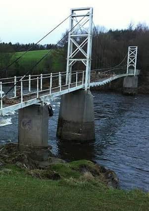 Dinckley's damaged suspension bridge over the River Ribble