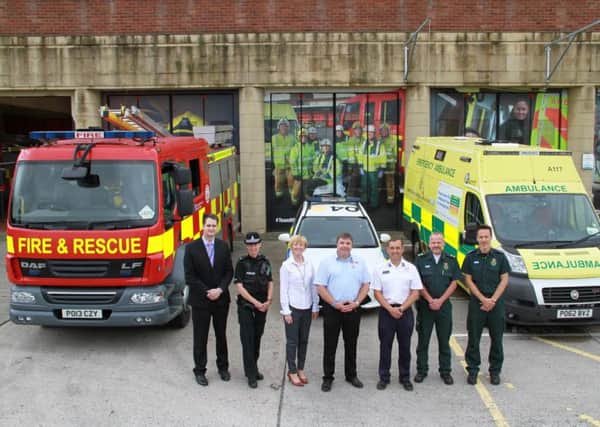 (left to right) DS Andy Doran and PC Helen Williams from Lancashire Constabulary, Sue Hird from Lancashire County Council, Mark Aldred of the Good Deeds Trust, Barry Hornsby from Lancashire Fire and Rescue and Gary Organ and Peter Sutcliffe from the North West Ambulance Service, supporting the Dementia Buddies scheme