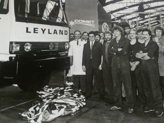 Workers at Leyland Trucks gather to welcome the Comet