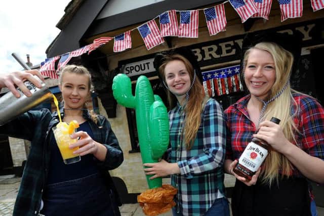 Thatched Hamlet held a Craft Beer, Bourbon and Wild West Weekend. Serving up the drinks were staff Bronte Archer, Lily Helme and Helen Rowe