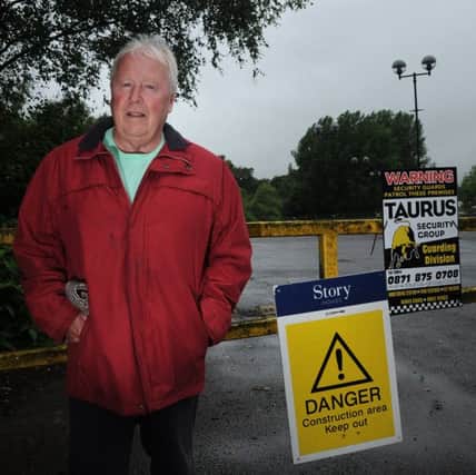 Chorley councillor Alan Whittaker is protesting against plans for 275 homes to be built on the site of former amusement park Camelot.
Councillor Whittaker at the site (security stopped us from getting any closer).  PIC BY ROB LOCK
15-7-2016