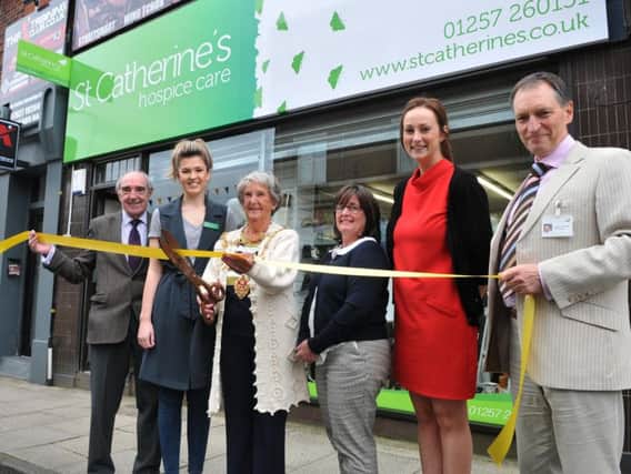 The Mayor of Chorley, Coun Doreen Dickinson with her daughter Lesley Moulton cutting the ribbon at the new St Catherine's Hospice Chorley shop, with Cliff Hughes Sally Booth, Rachel Hewitt and Stephen Greenhalgh