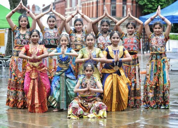 Picture by Julian Brown 09/07/16

Traditional Dancers from Abhinandana Dance Academy, Preston

Heavy rain at Preston Mini Mela which took place on Preston's Flag Market