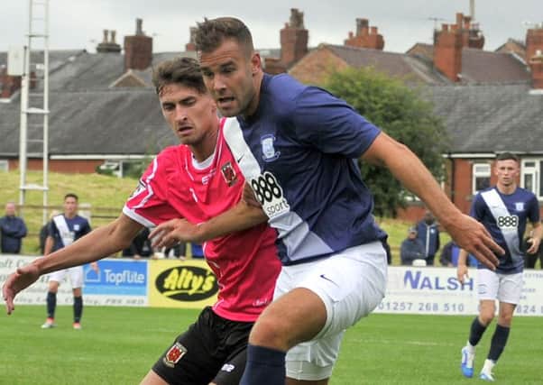 Tommy Spurr in action for PNE against Chorley. Photo: Kevin McGuinness