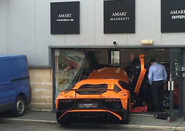 The Â£150,000 Lamborghini after it smashed into the showroom