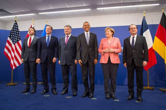 Politicians pose for a photograph during this years Nato summit in Warsaw, Poland. See letter