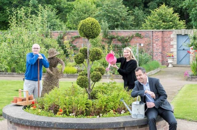 All set for Chorley Council second flower show. 
Cllr.Alistair Bradley council leader Michelle Scott of Botany Bay, and David Broan of Chorley and District Gardening Society.