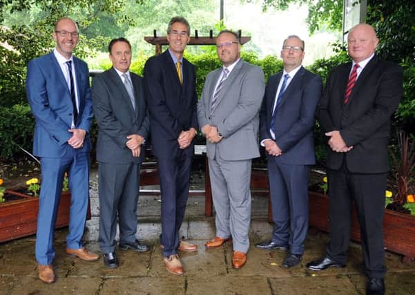 Picture shows the senior  teams from Cleanall and Care Facility Management Ltd