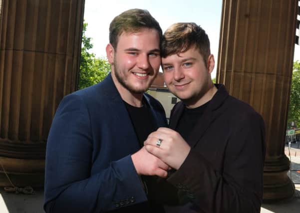 LEP  14-07-16
Richard Kennedy, left, proposed to his partner Kieran Haggitt on the outside balcony of The Harris, Preston.