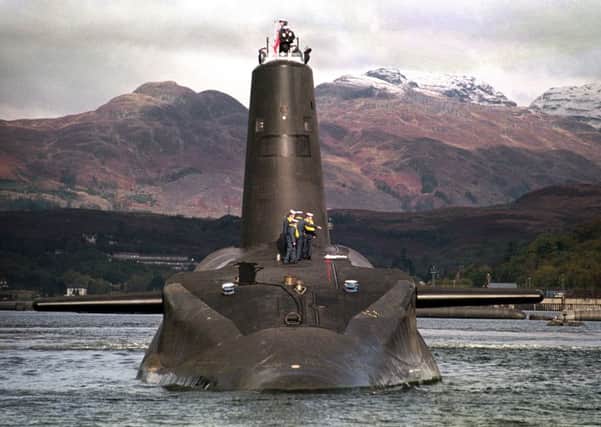 File photo dated 30/01/02 of the Royal Navy's submarine Vanguard which carries trident missiles. Theresa May will tell MPs not to gamble with the safety of British families ahead of a Commons vote on whether to renew the Trident nuclear deterrent. PRESS ASSOCIATION Photo. Issue date: Monday July 18, 2016.  MPs are set to vote tonight on renewal, which is estimated to cost around Â£40 billion, and Mrs May will tell them it would be "grossly irresponsible" not to back Trident. See PA story POLITICS Trident. Photo credit should read: PA Wire
