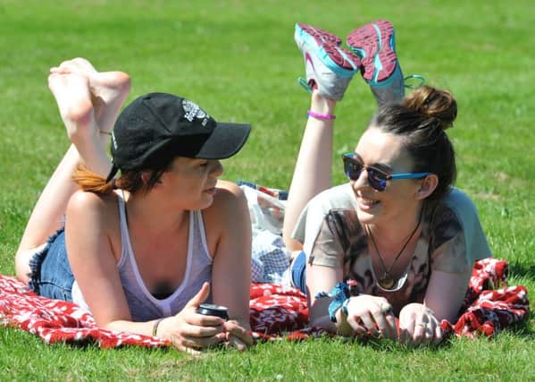 Photo Neil CrossPaige Stillwell and Sarah Leahy enjoying the hottest day of the year on Moor Park in Preston