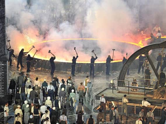 Industrial workers in a scene during the London Olympic Games 2012 Opening Ceremony
