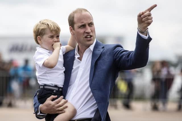 Prince George with his father the Duke of Cambridge