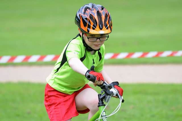 Total concentration from 7 year-old Eden Bamber as he negotiates the skills course