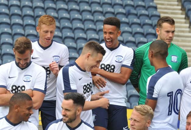 LOT OF LAUGHS: Eoin Doyle, Callum Robinson, Jermaine Beckford,Jordan Hugill, Chris Maxwell and Tommy Spurr share a joke during the official team photo day