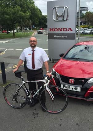 Barry Griffiths, assistant car manager at Greenacre Honda cycled from London to Paris for the Alzheimers Society