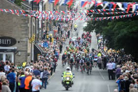 Crowds turn out to watch stage 2 of the Tour of Britain  pass through Longridge. The tour was a major tourist draw for the county