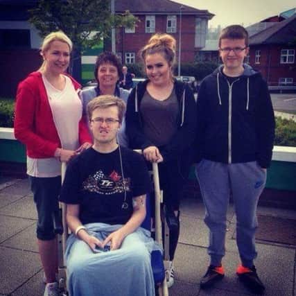 Callum Evans, 19, from Lostock Hall with his family at Manchesters Wythenshawe Hospital following a bike crash more than three months ago.