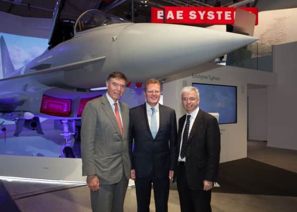 MASSIVE DEAL: Mark Menzies MP with Philip Dunne MP and BAE Systems group managing director for programmes and support, Nigel Whitehead