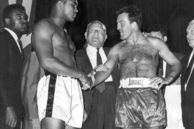 Brian London face to face with Muhammad Ali at the big fight weigh in
