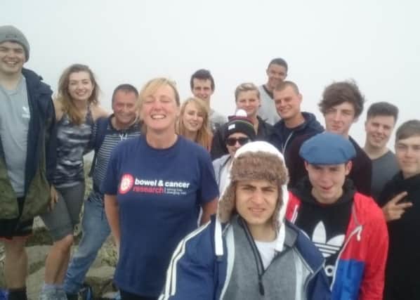 Tracey Greenwood (in B&CR t-shirt), son Rob Greenwood (in white fur-lined hat) climbed Great Gable mountain in memory of husband and dad Andy Greenwood.