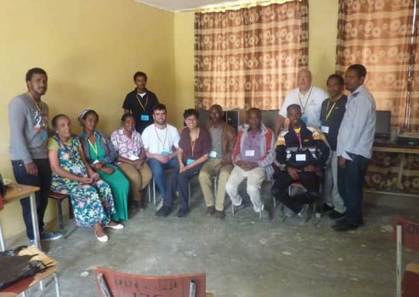 Peter Howard (white shirt, far right) and Sight Aid team with some of the training optometrists in the region of Tigray, Ethiopia as they work with charity Sight Aid International, to provide eye car in Africa.
