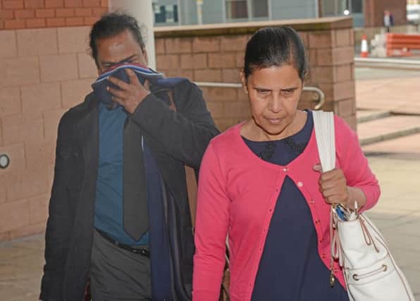 Pictured - (L-R) Meghadeven and Indranee Pumbien of Preston, Lancs., arriving at Preston Crown Court. Mr and Mrs Pumbien are on trial after being charged following an investigation into the alleged ill treatment and neglect of patients at Briarwood Rest Home in Lostock Hall. See Ross Parry Copy RPYCARE 

Thomas Temple/rossparry.co.uk