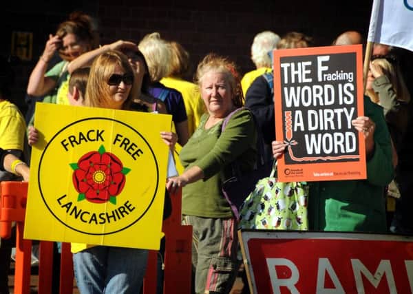Anti-fracking protestors demonstrating outside County Hall in Preston