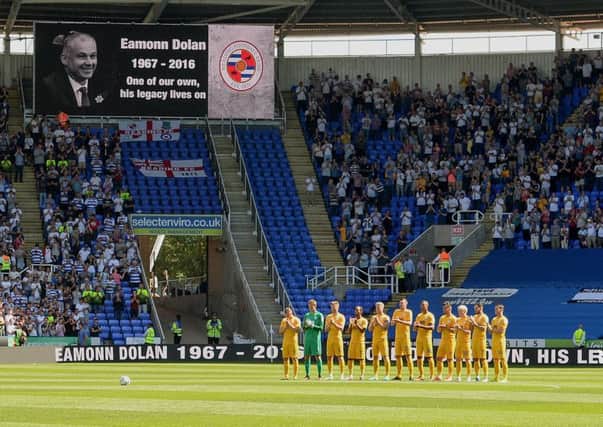 Preston fans during the minute's applause for former Reading academy coach Eamonn Dolan