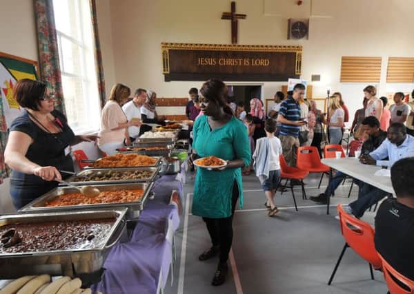 An event organised by the Red Cross for refugees from around the world, currently in Preston, where people could share food from their home countries