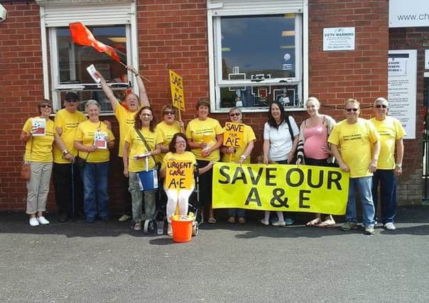 PROTEST: Chorley Hospital A&E campaigners at Chorley FC on Saturday.