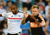 Fulhams Dennis Odoi (left) and Newcastles Matt Ritchie battle at Craven Cottage