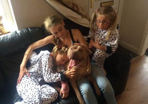 Maddison, Jenny, Darla and Lola Faith welcoming their pet home.