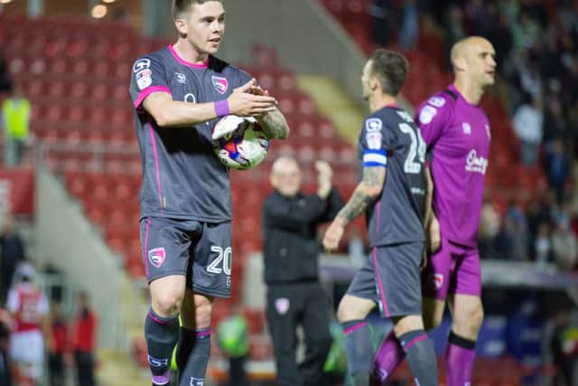 Jack Dunn salutes the Morecambe fans after his hat-trick. Picture: Matt Rushton
