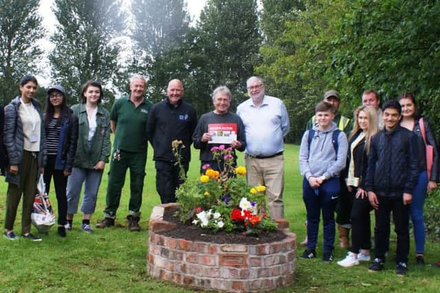 New planter at Fishwick Recreation Ground  Coun Robert Boswell, Bob Fletcher,  Dave from Preston Vocational Centre; and Park Rangers Terry Blackburn and Steve Smith. They are with a group of students who are doing a challenge event at the nature reserve