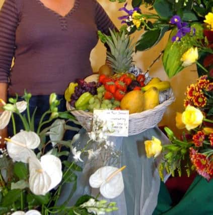 Tessa Ferguson with her display for the flower festival at St Thomas Church in Garstang