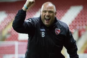 Jim Bentley celebrates one of his side's goals against Rotherham. Picture: Matt Rushton