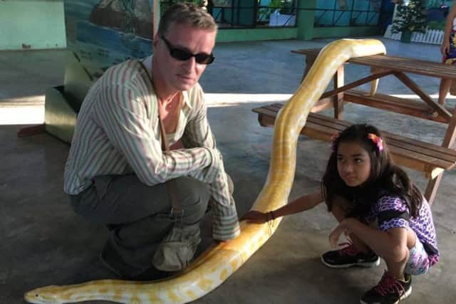 Nic McCarthy - Real Life Story -Nic with some of the local wildlife in the Philippines