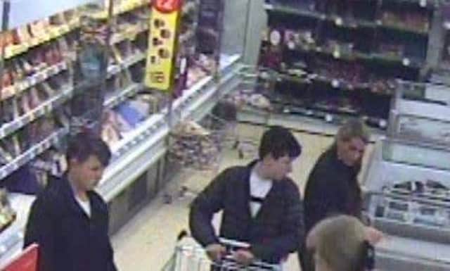 South Ribble Police want to speak with this female and two youths in connection with a theft from Iceland in Leyland. CREDIT: CCTV