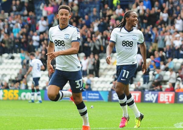 Callum Robinson celebrates after getting North End back in the game with a header
