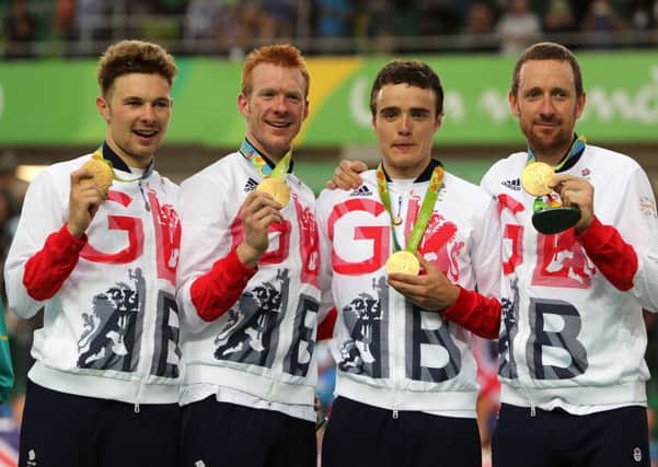 Great Britain's (left-right) Owain Doull, Ed Clancy, Steven Burke and Sir Bradley Wiggins with their gold medals