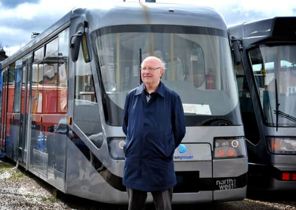 Lincoln Shields, of Trampower, with the tram that has been stored in Preston for more than a year gathering dust, as it awaits planning permission