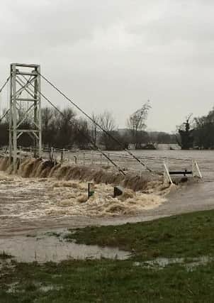 Dinckley footbridge at the height of the December floods (s)