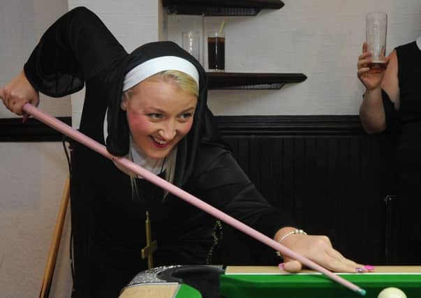 Members of Bamber Bridge Trades Hall pool teams held a 'tarts and vicars' fancy dress pool night to raise funds for Derian House.
Catherine Cookson in action.  PIC BY ROB LOCK
16-8-2016
